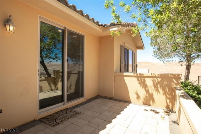 view of patio / terrace with fence
