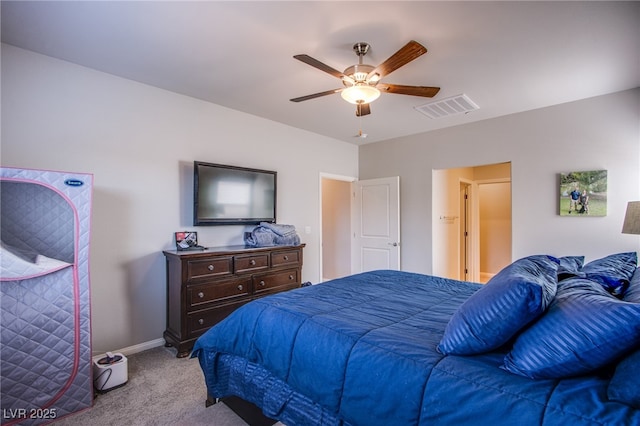 bedroom featuring baseboards, a ceiling fan, visible vents, and carpet flooring