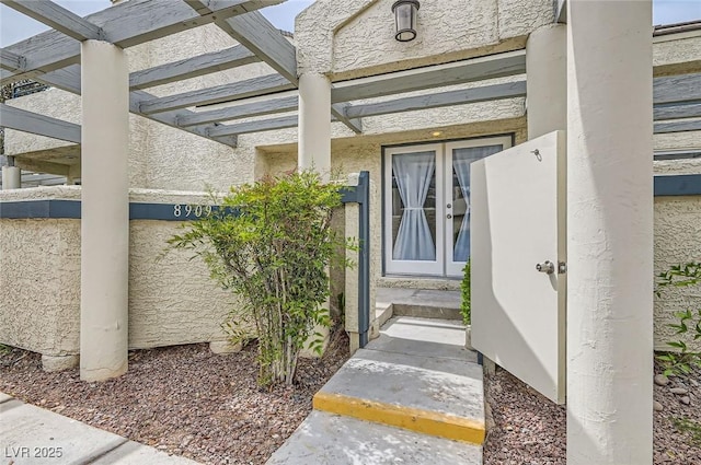 doorway to property with french doors