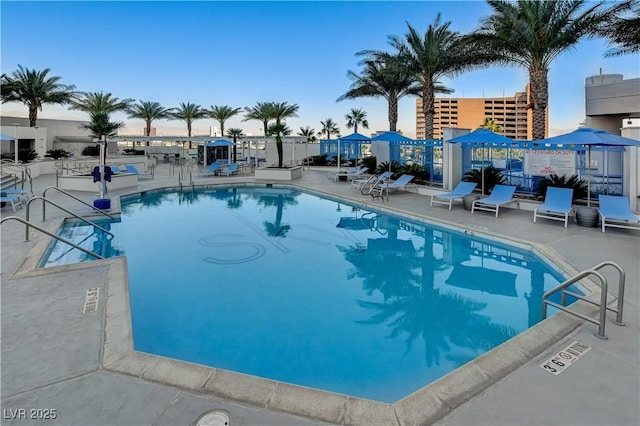 pool with a patio