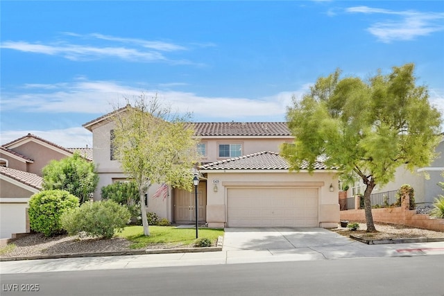 10409 Snowdon Flat Ct, Las Vegas, NV 89129 - view of front of home featuring a garage, a tile roof, stucco siding, and concrete driveway