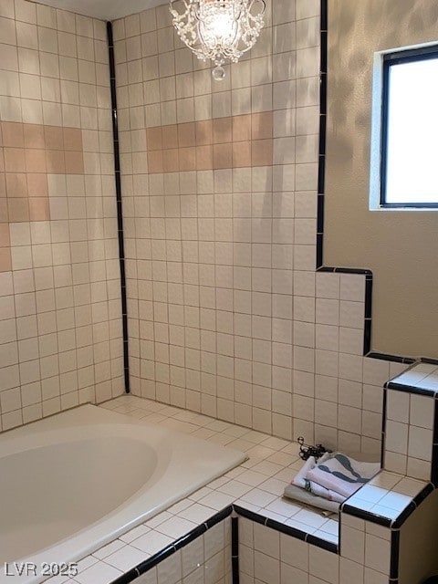 full bathroom with tiled bath