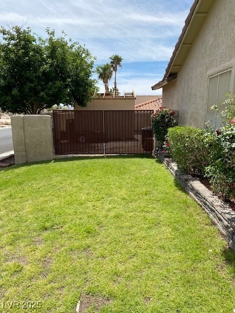 view of yard featuring fence