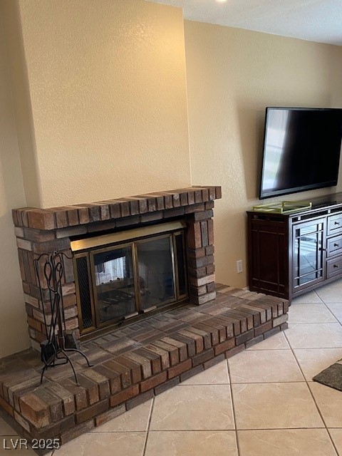 interior details with a brick fireplace