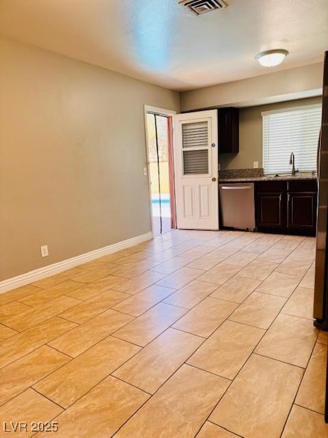 6786 Grandola Dr, Las Vegas, NV 89103 - kitchen featuring a sink, dark brown cabinets, visible vents, baseboards, and dishwasher