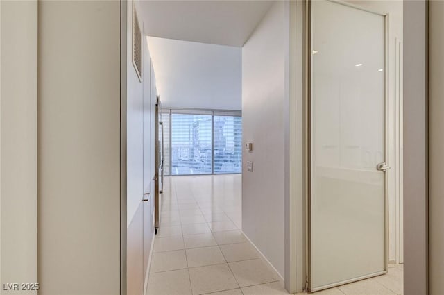 3726 S Las Vegas Blvd Unit 1003, Las Vegas, NV 89158 - hallway with light tile patterned flooring and baseboards