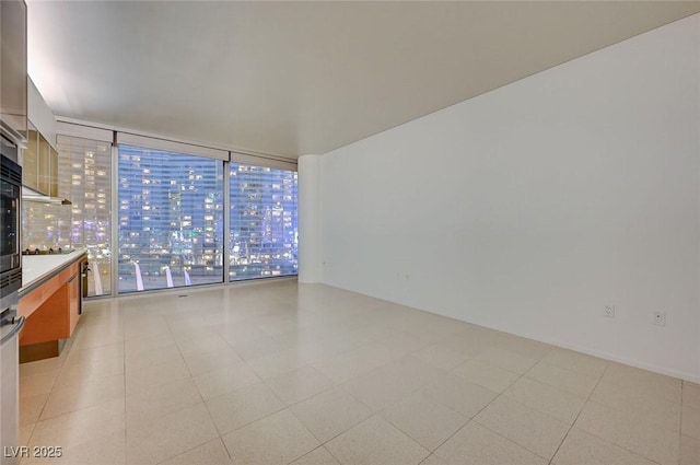 3726 S Las Vegas Blvd Unit 1003, Las Vegas, NV 89158 - unfurnished room with floor to ceiling windows