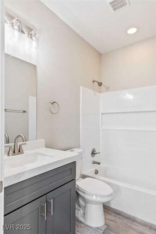 790 Lone Pine Rd, Pahrump, NV 89048 - full bath featuring wood finished floors, vanity, and shower / bathtub combination
