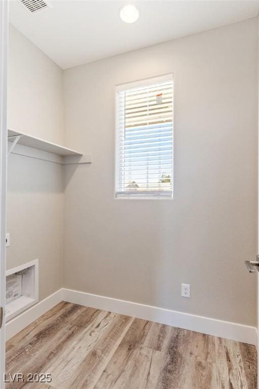 790 Lone Pine Rd, Pahrump, NV 89048 - laundry room featuring light wood finished floors and hookup for a washing machine
