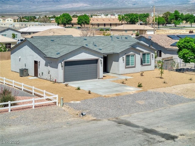 790 Lone Pine Rd, Pahrump, NV 89048 - ranch-style home with an attached garage, driveway, and stucco siding