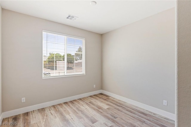 790 Lone Pine Rd, Pahrump, NV 89048 - unfurnished room with light wood-style floors and baseboards
