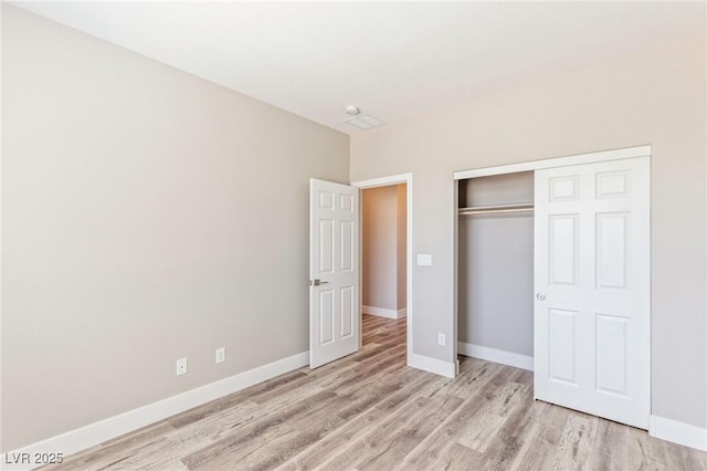 790 Lone Pine Rd, Pahrump, NV 89048 - unfurnished bedroom with light wood-style flooring and a closet