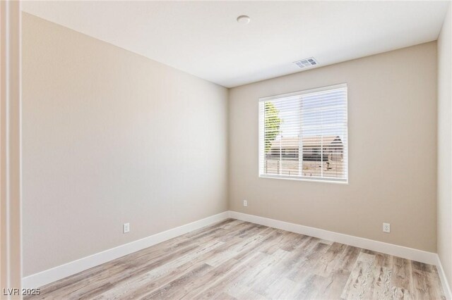 790 Lone Pine Rd, Pahrump, NV 89048 - empty room featuring light wood-style flooring and baseboards