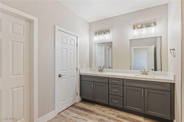 790 Lone Pine Rd, Pahrump, NV 89048 - bathroom with double vanity and wood finished floors
