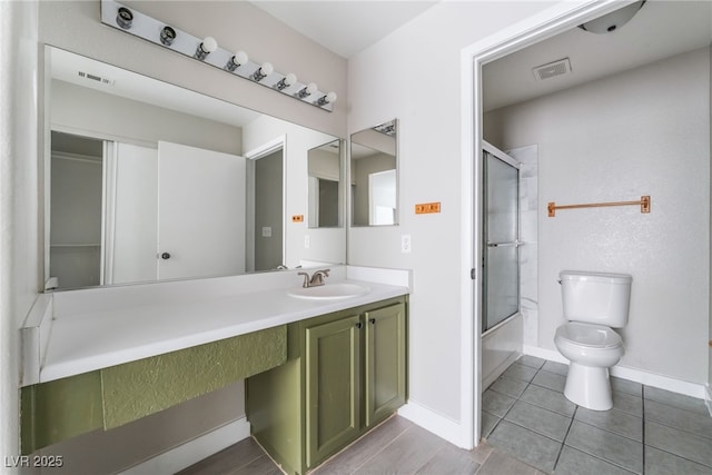 1400 Jamielinn Ln Unit 104, Las Vegas, NV 89110 - full bath with vanity, bath / shower combo with glass door, and tile patterned flooring