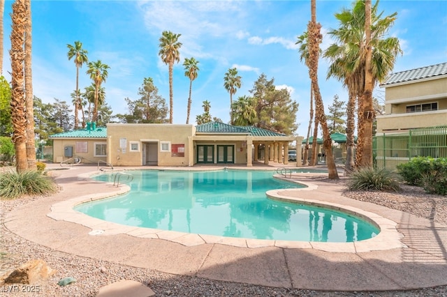1400 Jamielinn Ln Unit 104, Las Vegas, NV 89110 - community pool with a patio and french doors