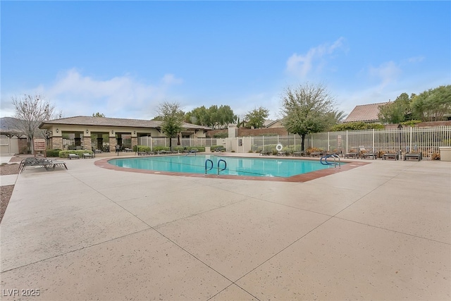 10664 Mount Jefferson Ave, Las Vegas, NV 89166 - community pool featuring a patio area