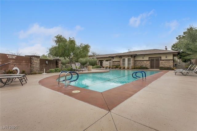 10664 Mount Jefferson Ave, Las Vegas, NV 89166 - view of swimming pool with a patio