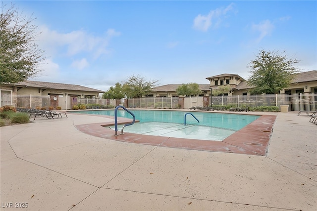 10664 Mount Jefferson Ave, Las Vegas, NV 89166 - community pool featuring a patio area