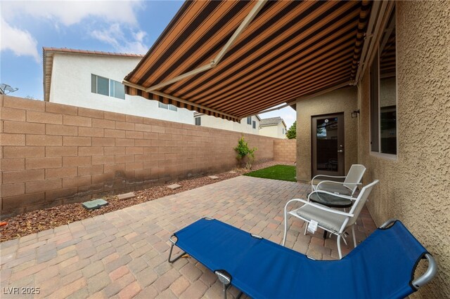 10664 Mount Jefferson Ave, Las Vegas, NV 89166 - fenced backyard featuring a patio