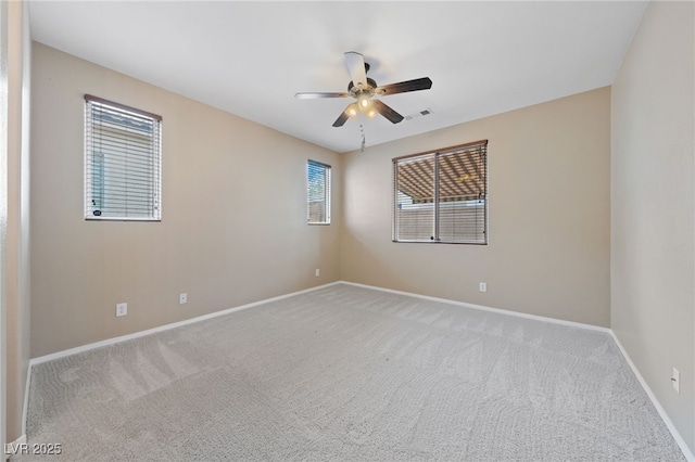 10664 Mount Jefferson Ave, Las Vegas, NV 89166 - empty room featuring ceiling fan, light carpet, and baseboards
