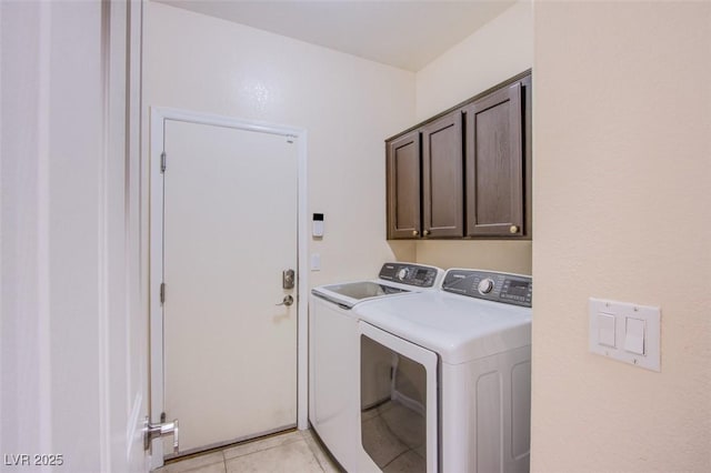 1552 Livingston Dr, Henderson, NV 89012 - laundry room with washing machine and clothes dryer, cabinet space, and light tile patterned floors