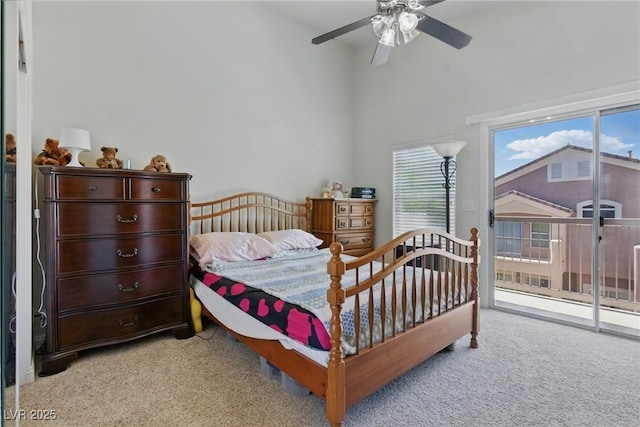bedroom featuring access to outside, carpet, and ceiling fan
