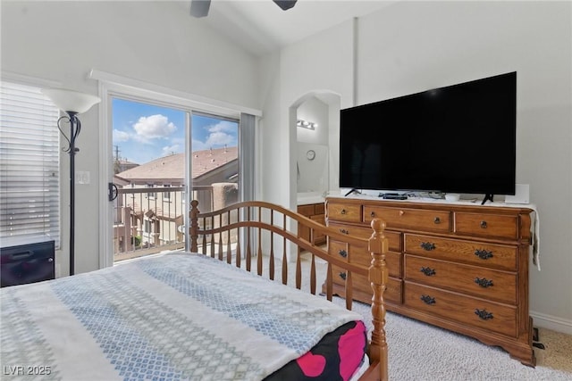 bedroom featuring carpet, a ceiling fan, arched walkways, baseboards, and access to outside