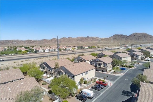 bird's eye view with a residential view and a mountain view