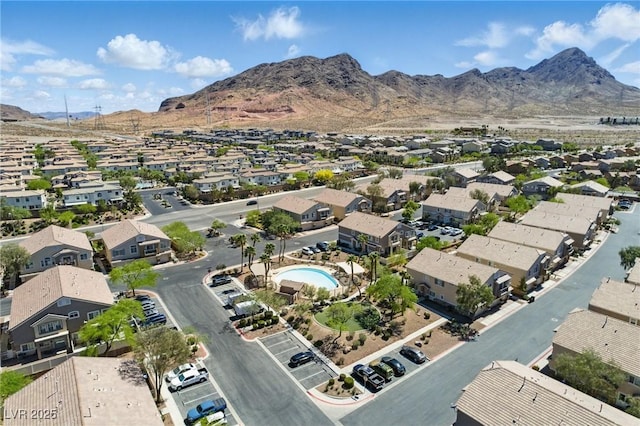 bird's eye view featuring a residential view and a mountain view