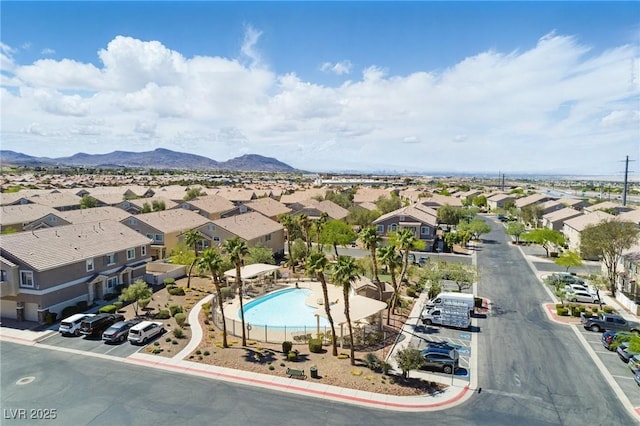 aerial view featuring a mountain view and a residential view