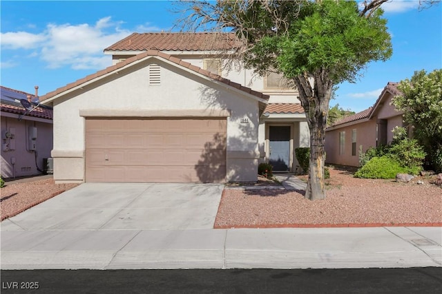 3644 Shanagolden St, Las Vegas, NV 89129 - view of front of property with stucco siding, a tile roof, a garage, and concrete driveway