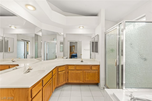 5224 Dana Springs Way, Las Vegas, NV 89130 - ensuite bathroom featuring tile patterned flooring, a wealth of natural light, a sink, and a shower stall