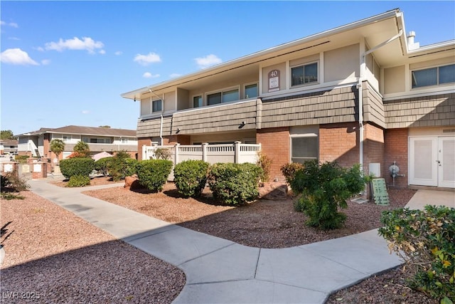 multi unit property with brick siding
