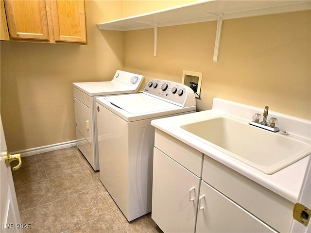 9324 Pitching Wedge Dr, Las Vegas, NV 89134 - laundry area featuring cabinet space, washer and dryer, light tile patterned floors, and baseboards