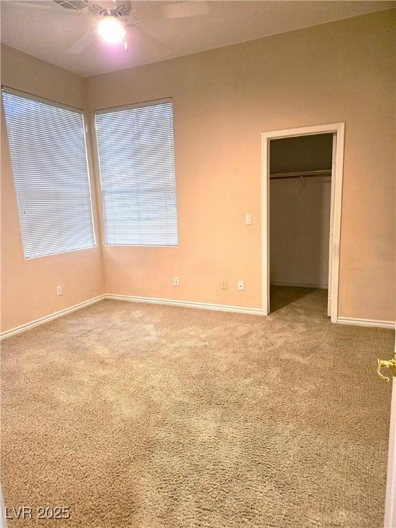 9324 Pitching Wedge Dr, Las Vegas, NV 89134 - unfurnished room with carpet floors, baseboards, and ceiling fan