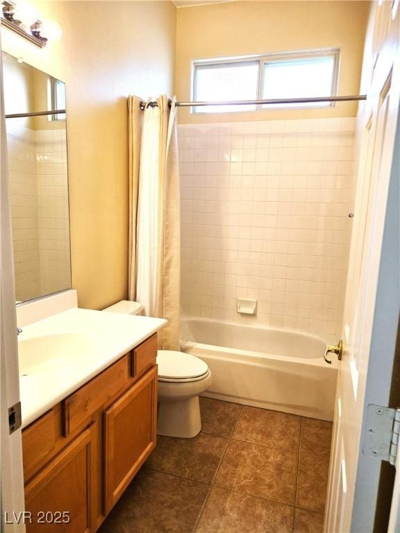 9324 Pitching Wedge Dr, Las Vegas, NV 89134 - bathroom featuring vanity, toilet, shower / bath combo with shower curtain, and tile patterned floors