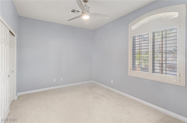 11784 Golden Moments Ave, Las Vegas, NV 89138 - unfurnished bedroom featuring light colored carpet, baseboards, visible vents, and a closet
