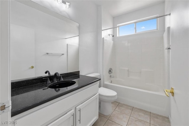 full bathroom with shower / bath combination, tile patterned flooring, vanity, and toilet