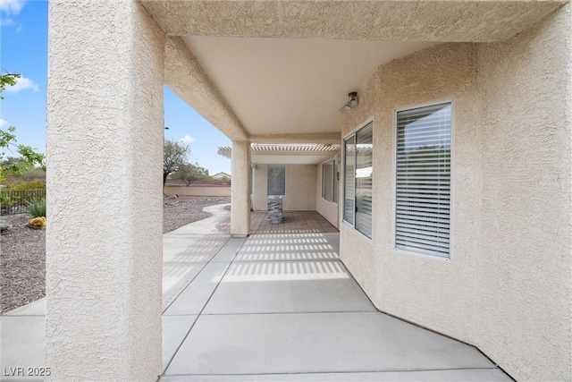 view of patio / terrace with fence