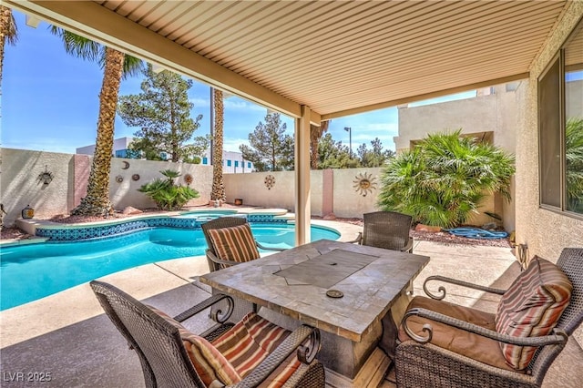 8942 Galena Crossing St, Las Vegas, NV 89123 - view of swimming pool featuring a patio area, a fenced backyard, and a pool with connected hot tub