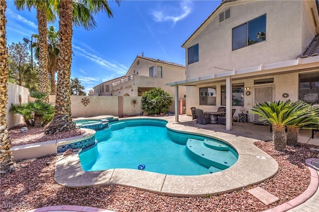 8942 Galena Crossing St, Las Vegas, NV 89123 - view of swimming pool with a pool with connected hot tub, a fenced backyard, and a patio