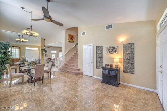 8942 Galena Crossing St, Las Vegas, NV 89123 - entryway with a ceiling fan, stairway, high vaulted ceiling, baseboards, and a chandelier
