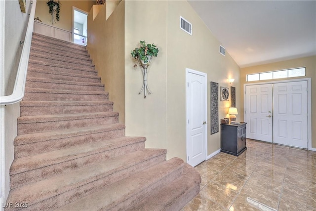 8942 Galena Crossing St, Las Vegas, NV 89123 - foyer featuring stairway, high vaulted ceiling, and baseboards