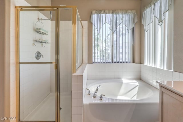8942 Galena Crossing St, Las Vegas, NV 89123 - bathroom featuring plenty of natural light, a shower stall, and a bath