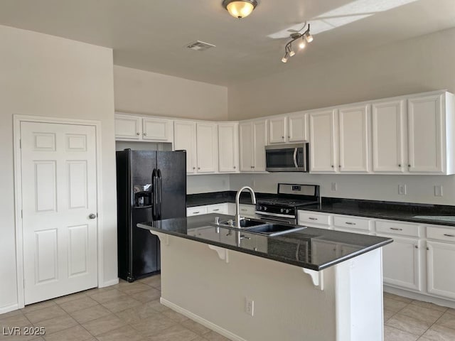 825 Happy Sparrow Ave, Henderson, NV 89052 - kitchen featuring white cabinetry, stainless steel appliances, visible vents, and a sink