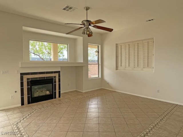 825 Happy Sparrow Ave, Henderson, NV 89052 - unfurnished living room featuring visible vents, ceiling fan, and a healthy amount of sunlight