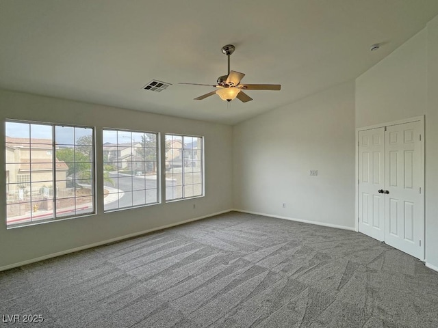 825 Happy Sparrow Ave, Henderson, NV 89052 - spare room with baseboards, visible vents, carpet, and ceiling fan