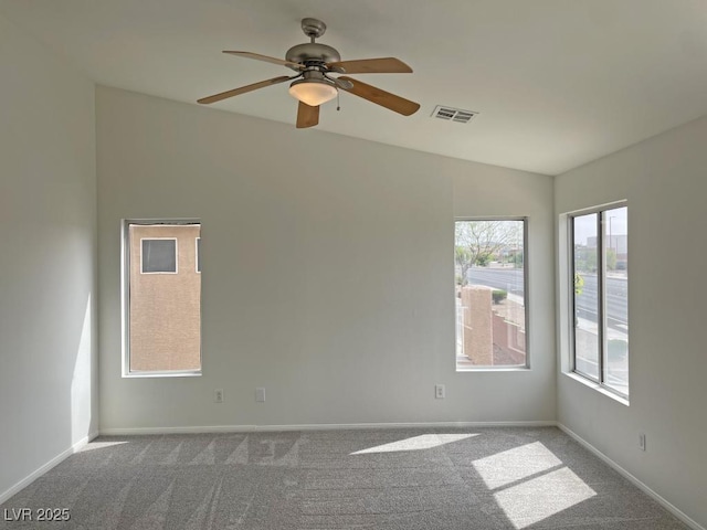 825 Happy Sparrow Ave, Henderson, NV 89052 - unfurnished room featuring visible vents, carpet flooring, and ceiling fan