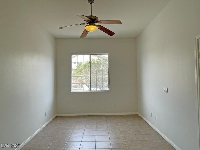 825 Happy Sparrow Ave, Henderson, NV 89052 - unfurnished room with a ceiling fan, baseboards, and light tile patterned floors